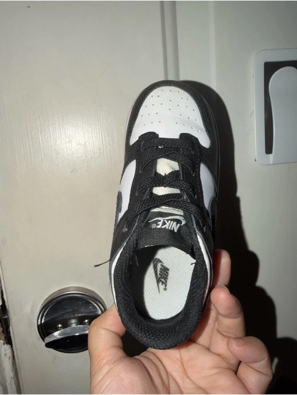 Nike Kids Black and White Low-Top Sneakers with Swoosh